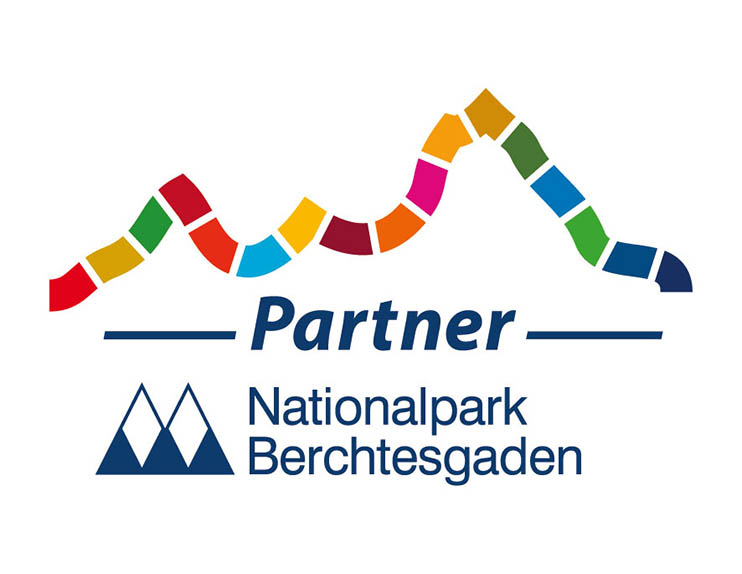 The picture shows the logo of the National Park Partners Initiative